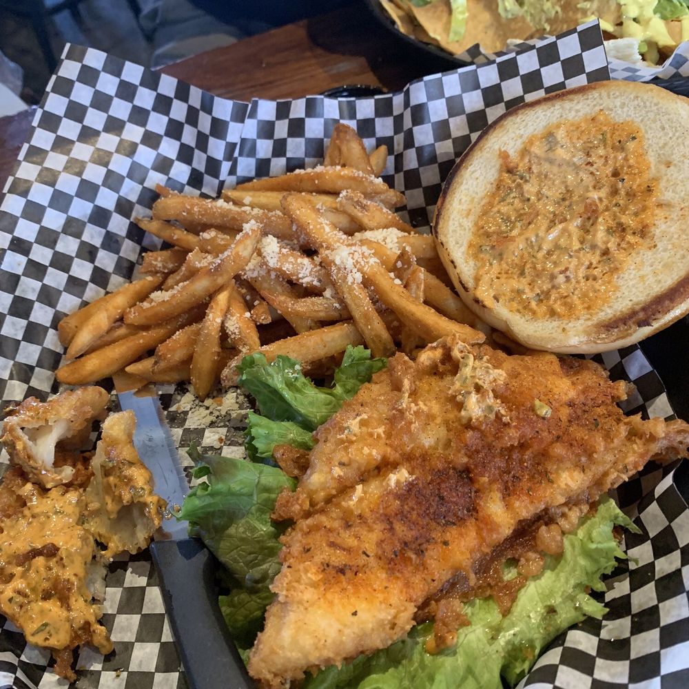 The Water Dog - Fried catfish sandwich. TWO huge pieces of catfish. I had to eat one separate. Amazing - New American Near Me - Lynchburg, Virginia The Water Dog - Fried catfish sandwich. TWO huge pieces of catfish. I had to eat one separate. Amazing - New American Near Me - Lynchburg, Virginia