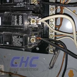 CHC Home Inspection - Double tapped 30 amp breaker. Good find by our team as this breaker is not designed to accept double taps.
