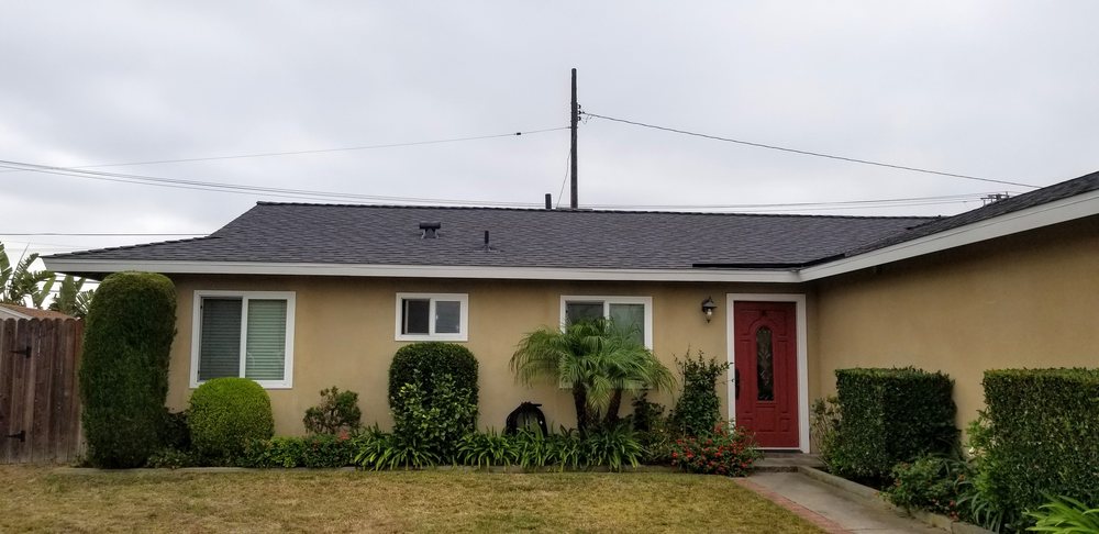 Slide of Tom Byer Roofing Service