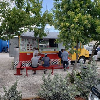 Taco Express - A couple of benches,  3 stools in the shade. Got mine to go. - Food Trucks Near Me - Key West, Florida