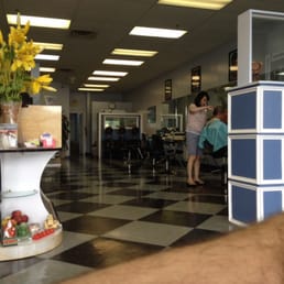 In the waiting area.  They keep the floors clean and I hear good conversations.