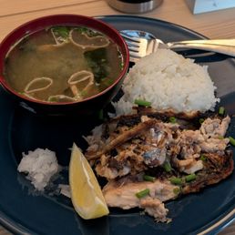 The mackerel cooked, served with rice, grated daikon, lemon and miso soup. The mackerel cooked, served with rice, grated daikon, lemon and miso soup.