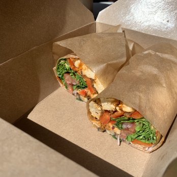Natural Cafe - Chipotle Chicken Burger in a whole wheat wrap, with raw onions, sautéed mushrooms and spinach added - Salad Near Me - Goleta, California