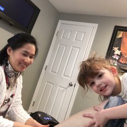 Nails By Khoi - Yen being assisted by my granddaughter