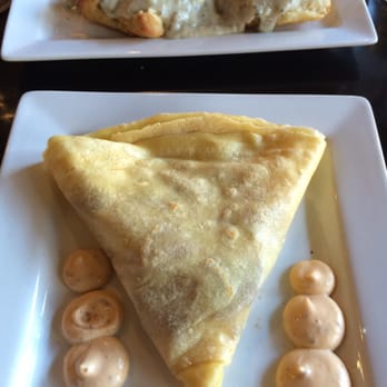 Rooster - Downtown - Half order of biscuits and gravy and mo.made german sausage crepe with vermont cheddar. - Creperies Near Me - St. Louis, Missouri Rooster - Downtown - Half order of biscuits and gravy and mo.made german sausage crepe with vermont cheddar. - Creperies Near Me - St. Louis, Missouri