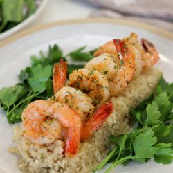 Grilled shrimp over cauliflower rice at Vivian's
