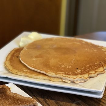 Just 1 Bite Too - a stack of pancakes on a plate - American Near Me - Mattydale, New York Just 1 Bite Too - a stack of pancakes on a plate - American Near Me - Mattydale, New York