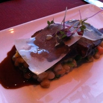 Scarpetta - Braised Short Ribs of Beef with winter vegetable and farro risotto - Italian Near Me - Las Vegas, Nevada Scarpetta - Braised Short Ribs of Beef with winter vegetable and farro risotto - Italian Near Me - Las Vegas, Nevada