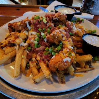 Miller's Ale House - Zinger Mountain  Melt with the 5 pepper  hot  sauce. - Sports Bars Near Me - Pensacola, Florida
