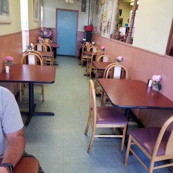 Mexican Deli - a man sitting at a table in a restaurant - Mexican Near Me - Lincoln, California Mexican Deli - a man sitting at a table in a restaurant - Mexican Near Me - Lincoln, California