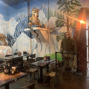 DinoLand Cafe - Borderline copyright infringement of Ice Age. Photo is zoomed out so you can see the surrounding aesthetic. - New American Near Me - Myrtle Beach, South Carolina