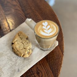 The Red Mug Coffee Company - Half eaten cookie + cortado