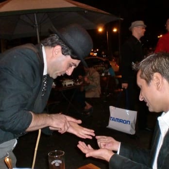 Mai Thai - A street performer brings a close-up magic show to our table - Thai Near Me - Cologne, NW