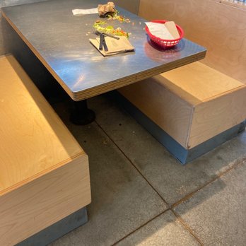Chipotle Mexican Grill - This is leftover food has been sitting there for 20 minutes so even prevents people in groups of four from even sitting down - Mexican Near Me - Sarasota, Florida Chipotle Mexican Grill - This is leftover food has been sitting there for 20 minutes so even prevents people in groups of four from even sitting down - Mexican Near Me - Sarasota, Florida