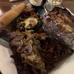 Pub steak with a loaded baker