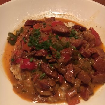 Copper Canyon Grill - Shrimp and grits...hard to tell with all the sausage - American Near Me - Lanham, Maryland