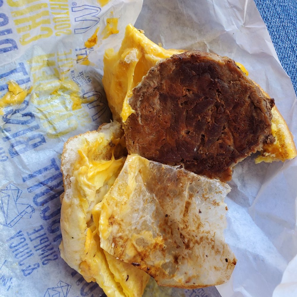 McDonald's - a half eaten breakfast sandwich on a wrapper - Fast Food Near Me - Liberty, Texas McDonald's - a half eaten breakfast sandwich on a wrapper - Fast Food Near Me - Liberty, Texas