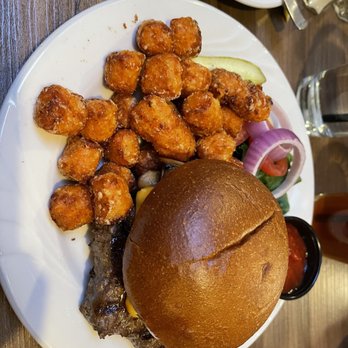 Gold Bison Grill - Bison burger with bacon and grilled mushrooms. Side of sweet potato puffs - American Near Me - Rapid City, South Dakota Gold Bison Grill - Bison burger with bacon and grilled mushrooms. Side of sweet potato puffs - American Near Me - Rapid City, South Dakota