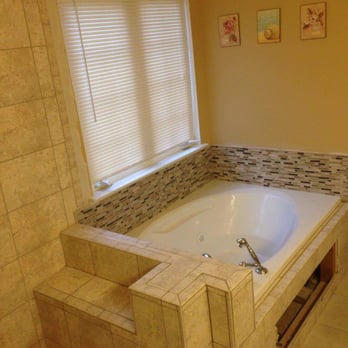 Haggerty Home Improvements - Don't let your bathroom be bland. Adding accent tiles, shelves, and shower benches can be a simple way to make your bathroom pop! - Flooring Near Me - McKees Rocks, Pennsylvania