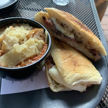 Tilman's - Prosciutto, fig paste and mozzarella panini with tomato soup - Wine Bars Near Me - Charlottesville, Virginia