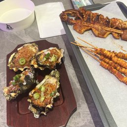 Grilled oysters, corn, squid