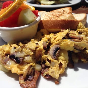 Turn 12 - Sausage and Onion Scramble with fruit side - American Near Me - Monterey, California Turn 12 - Sausage and Onion Scramble with fruit side - American Near Me - Monterey, California