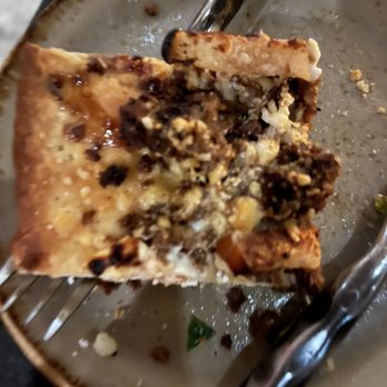 Willows Lodge - One piece of the pear and pork flatbread - deliciousness - Hotels Near Me - Woodinville, Washington Willows Lodge - One piece of the pear and pork flatbread - deliciousness - Hotels Near Me - Woodinville, Washington