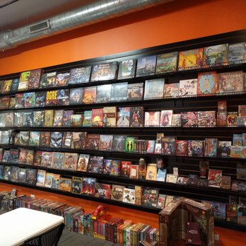 The Gaming Goat - Base games on the wall, expansions underneath - Hobby Shops Near Me - Elmhurst, Illinois