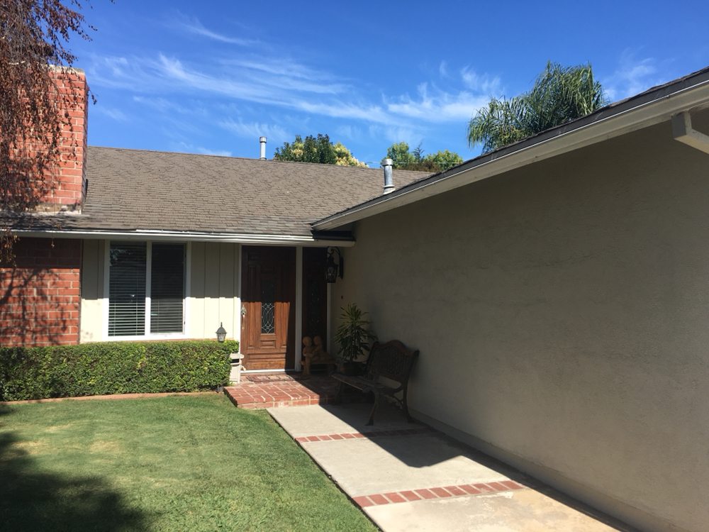 Slide of Espino Roofing