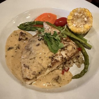 The Depot Restaurant - Pan seared halibut topped with an amazing Porcini mushroom cream sauce, served on top of couscous and roasted vegetables! - New American Near Me - Seaview, Washington The Depot Restaurant - Pan seared halibut topped with an amazing Porcini mushroom cream sauce, served on top of couscous and roasted vegetables! - New American Near Me - Seaview, Washington
