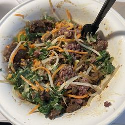 BIBIBOP Asian Grill - Purple rice, noodles, bean sprouts, carrots, kale, cheese, yum yum sauce and steak.