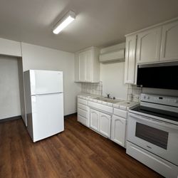 J Anderson Construction - New LVP, full paint, new baseboard, new blinds new appliances full bathroom remodel
