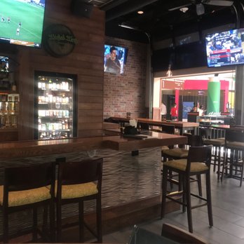 The Brass Tap - Part of bar and seating area that you can see the mall - Beer Bar Near Me - Towson, Maryland