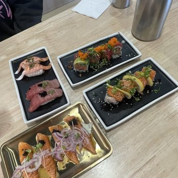 Sushi REV - salmon carpaccio, toro, truffle salmon belly, mush dragon roll, and ultimate salmon roll - Sushi Bars Near Me - Irvine, California Sushi REV - salmon carpaccio, toro, truffle salmon belly, mush dragon roll, and ultimate salmon roll - Sushi Bars Near Me - Irvine, California