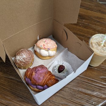 Cafe Mochiko - From left to right: pandan bakery, strawberry creme melon pan, ube croissant, mochi and cherry, hochija milk tea - Bakeries Near Me - Cincinnati, Ohio Cafe Mochiko - From left to right: pandan bakery, strawberry creme melon pan, ube croissant, mochi and cherry, hochija milk tea - Bakeries Near Me - Cincinnati, Ohio