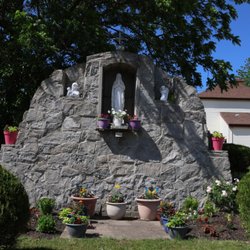St Thomas Aquinas Church - Mary Grotto located behind the rectory