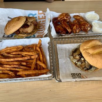 Smashburger - Top Right: BBQ WINGS, Bottom Left: SWEET POTATO FRIES, Bottom Right: TRUFFLE MUSHROOM SWISS BURGER - Burgers Near Me - Oak Brook, Illinois Smashburger - Top Right: BBQ WINGS, Bottom Left: SWEET POTATO FRIES, Bottom Right: TRUFFLE MUSHROOM SWISS BURGER - Burgers Near Me - Oak Brook, Illinois