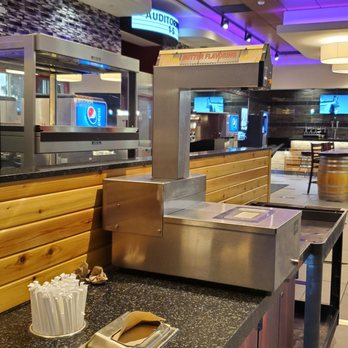 CineLux Plaza Theatre - Self serve butter for popcorn - Cinema Near Me - Campbell, California CineLux Plaza Theatre - Self serve butter for popcorn - Cinema Near Me - Campbell, California