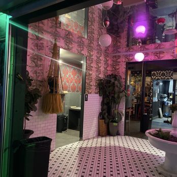 Oddfellows Liquor Bar - The bathroom between the spots is such a neat plaza feel - Bars Near Me - Cincinnati, Ohio