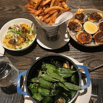 Navy Blue - Crab chicken rice, baked oysters, mussels + fries - Seafood Near Me - Houston, Texas Navy Blue - Crab chicken rice, baked oysters, mussels + fries - Seafood Near Me - Houston, Texas