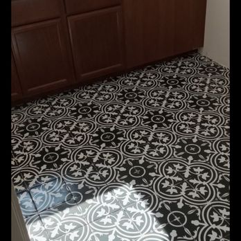 Valenz Construction - Laundry room new tile - General Contractors Near Me