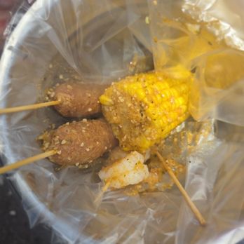 University District Street Fair - Cajun bucket of seafood (chicken sausage, corn, shrimp skewer and mussels skewer). You get to keep the bucket! - Festivals Near Me - Seattle, Washington University District Street Fair - Cajun bucket of seafood (chicken sausage, corn, shrimp skewer and mussels skewer). You get to keep the bucket! - Festivals Near Me - Seattle, Washington