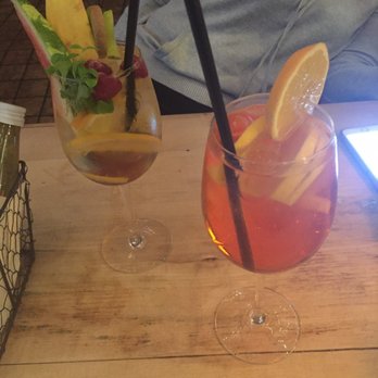 Zielona Weranda - Aperol spritz in the front, white wine spritzer in back - Cafes Near Me - Poznań, WP Zielona Weranda - Aperol spritz in the front, white wine spritzer in back - Cafes Near Me - Poznań, WP
