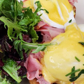 The Smith - The Smith Eggs Benedict with greens. Delicious. Shaved ham and perfectly poached eggs with tasty hollandaise and a soft English Muffin. - New American Near Me - New York, New York The Smith - The Smith Eggs Benedict with greens. Delicious. Shaved ham and perfectly poached eggs with tasty hollandaise and a soft English Muffin. - New American Near Me - New York, New York