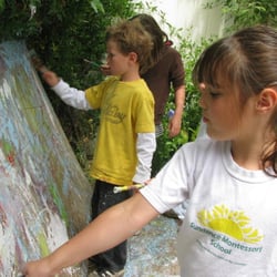 Sundance Montessori - painting a mural