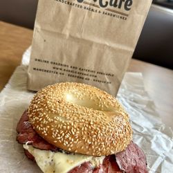 Bagel Cafe - Grilled Pastrami, Swiss Cheese, Deli Mustard on Sesame Bagel