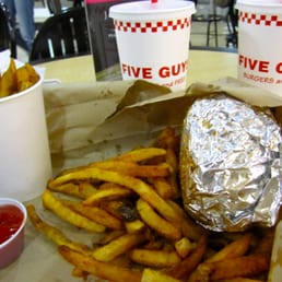 a burger and fries with ketchup a burger and fries with ketchup