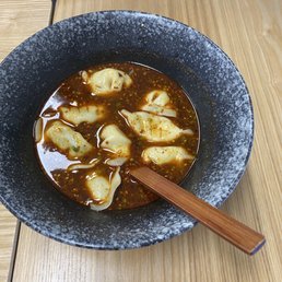 House Special Spicy Dumplings (Chicken)钟水饺(鸡肉玉米)8 pieces(soup is packaged under the dumplings ) House Special Spicy Dumplings (Chicken)钟水饺(鸡肉玉米)8 pieces(soup is packaged under the dumplings )