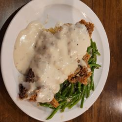 The Big River Grille - This is an order of chicken fried steak split into 2!!!!