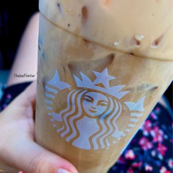 Starbucks - a person holding a cup of iced coffee - Coffee & Tea Near Me - Kahului, Hawaii Starbucks - a person holding a cup of iced coffee - Coffee & Tea Near Me - Kahului, Hawaii